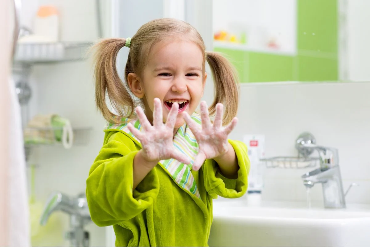 little-girl-washing-hands-with-non-toxic-liquid-hand-soap (1)
